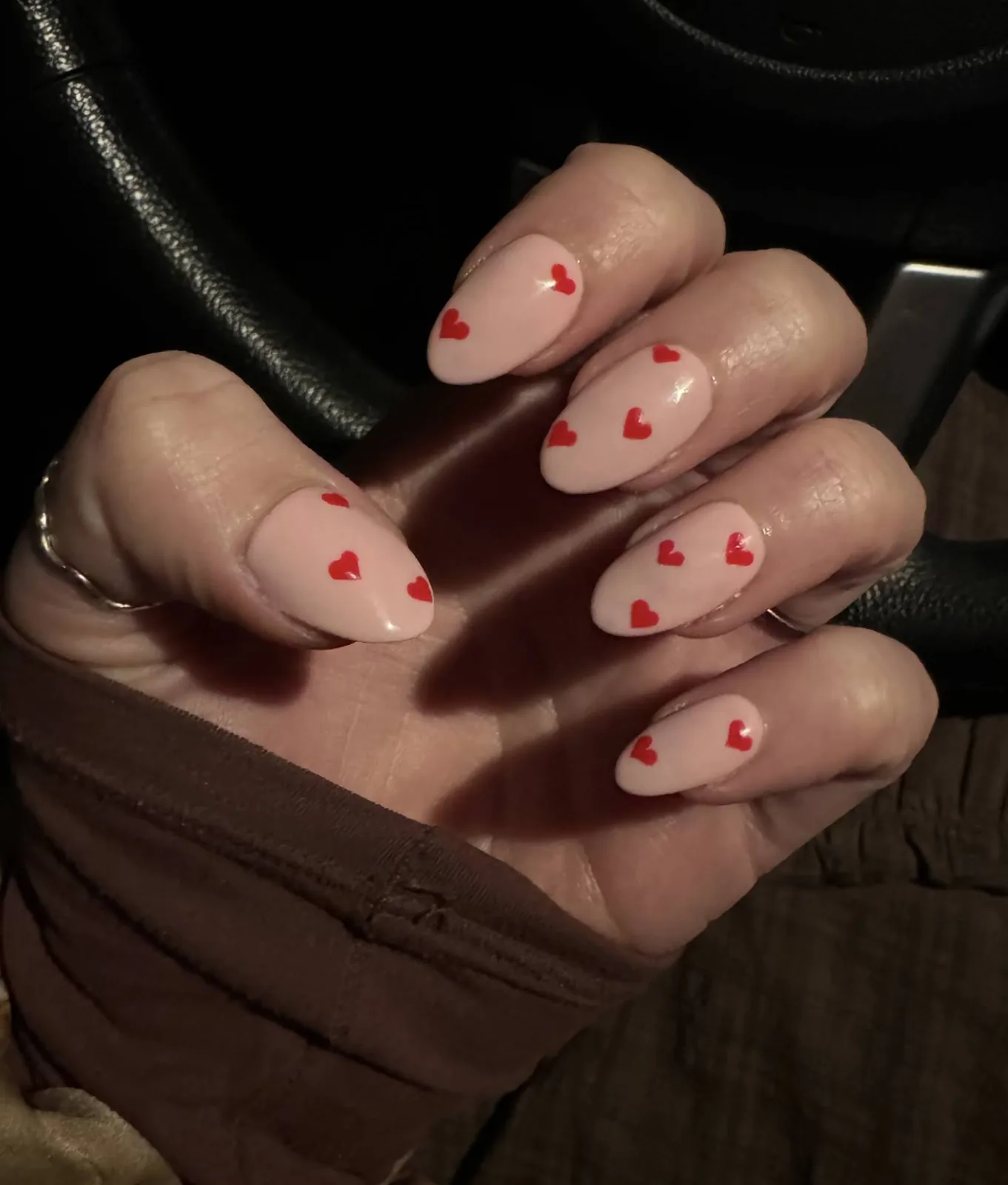 Client's almond nails with red heart nail art